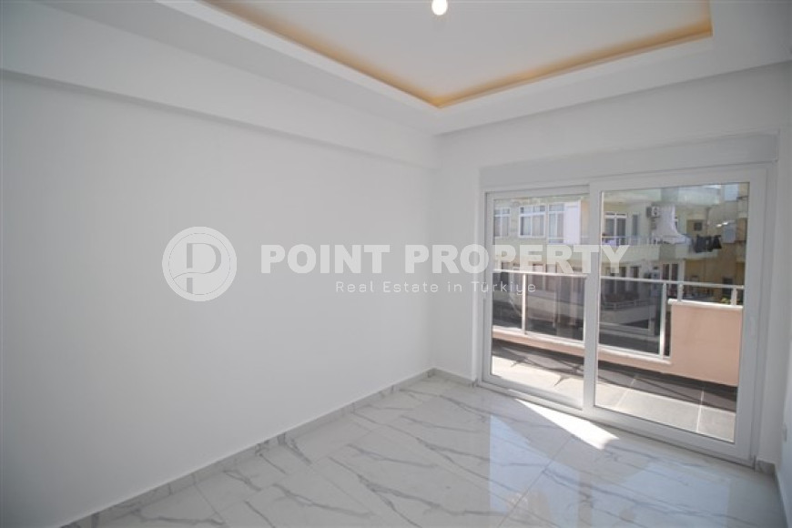 Large bright apartment with three bedrooms in the center of Alanya and 500 meters from the sea.-id-4463-photo-7