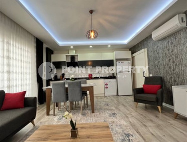 Стильная современная квартира 2+1 в 600 метрах от моря в центре спокойного района Аланьи Тосмур.-id-4465-фото-2