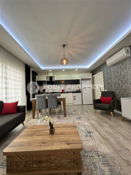 Стильная современная квартира 2+1 в 600 метрах от моря в центре спокойного района Аланьи Тосмур.-id-4465-фото-2