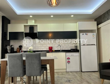 Стильная современная квартира 2+1 в 600 метрах от моря в центре спокойного района Аланьи Тосмур.-id-4465-фото-3