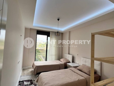 Стильная современная квартира 2+1 в 600 метрах от моря в центре спокойного района Аланьи Тосмур.-id-4465-фото-5