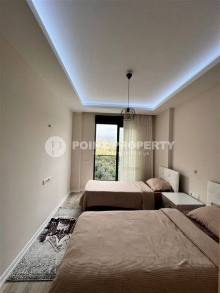 Стильная современная квартира 2+1 в 600 метрах от моря в центре спокойного района Аланьи Тосмур.-id-4465-фото-6