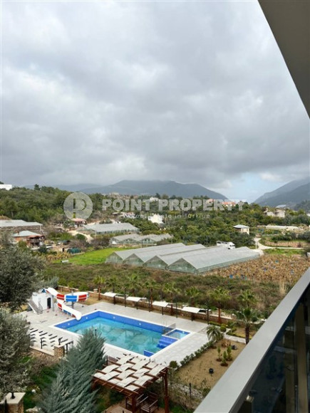 Стильная современная квартира 2+1 в 600 метрах от моря в центре спокойного района Аланьи Тосмур.-id-4465-фото-11