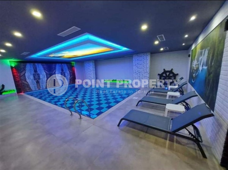 Стильная современная квартира 2+1 в 600 метрах от моря в центре спокойного района Аланьи Тосмур.-id-4465-фото-12