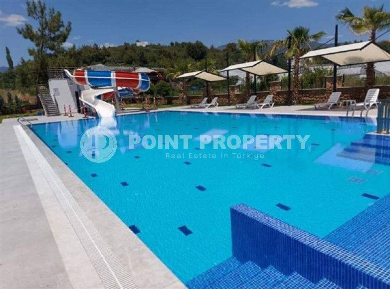 Стильная современная квартира 2+1 в 600 метрах от моря в центре спокойного района Аланьи Тосмур.-id-4465-фото-14