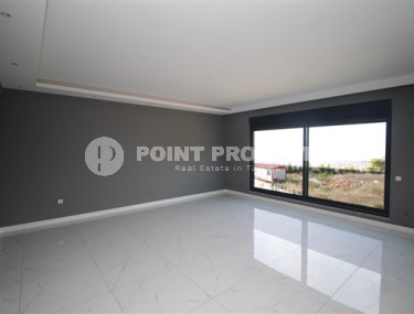 Дуплекс 5+1 с собственным садом, в двух с половиной километрах от моря в элитном районе Аланьи - Бекташ.-id-4466-фото-3