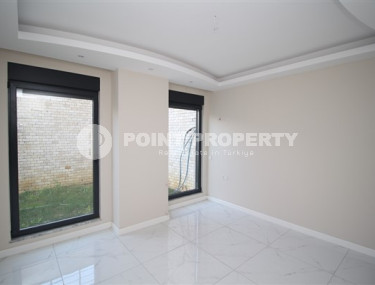 Дуплекс 5+1 с собственным садом, в двух с половиной километрах от моря в элитном районе Аланьи - Бекташ.-id-4466-фото-4