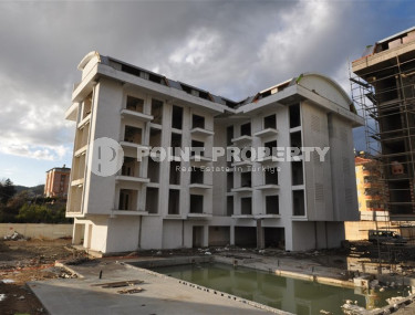 Двухкомнатные апартаменты в резиденции 2022 года состоящей из трех корпусов, район Оба-id-4473-фото-2