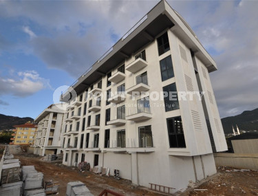 Двухкомнатные апартаменты в резиденции 2022 года состоящей из трех корпусов, район Оба-id-4473-фото-3