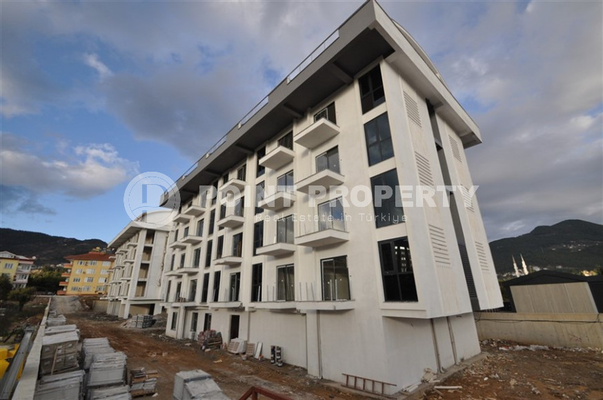 Двухкомнатные апартаменты в резиденции 2022 года состоящей из трех корпусов, район Оба-id-4473-фото-3