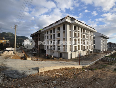 Двухкомнатные апартаменты в резиденции 2022 года состоящей из трех корпусов, район Оба-id-4473-фото-4