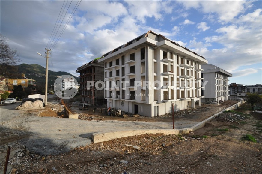 Двухкомнатные апартаменты в резиденции 2022 года состоящей из трех корпусов, район Оба-id-4473-фото-4