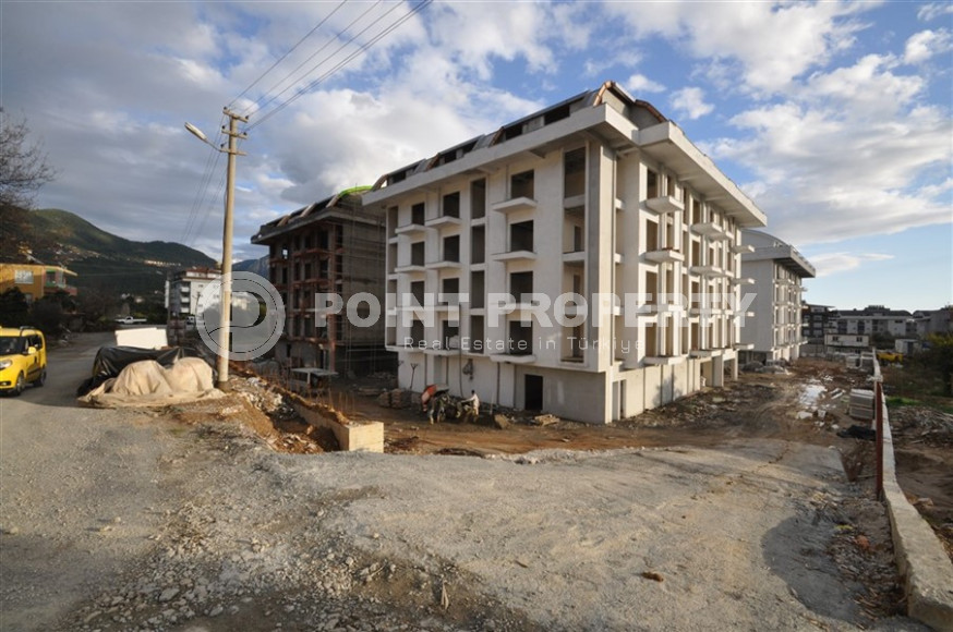 Двухкомнатные апартаменты в резиденции 2022 года состоящей из трех корпусов, район Оба-id-4473-фото-5