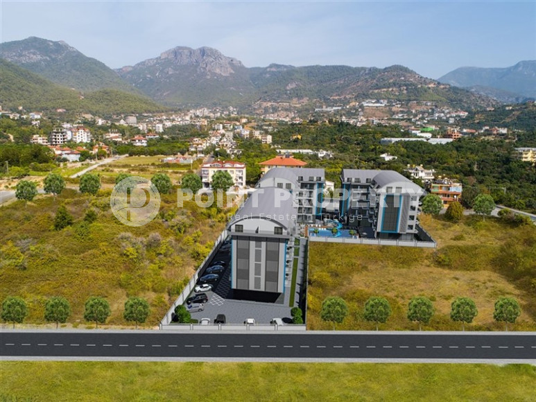 Двухкомнатные апартаменты в резиденции 2022 года состоящей из трех корпусов, район Оба-id-4473-фото-6