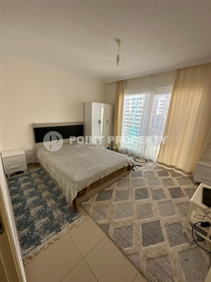 Inexpensive apartment 60 m2 with furniture and a glazed balcony in a high-rise building, Mahmutlar district-id-4474-photo-2