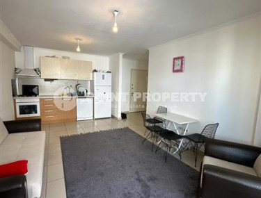 Inexpensive apartment 60 m2 with furniture and a glazed balcony in a high-rise building, Mahmutlar district-id-4474-photo-3