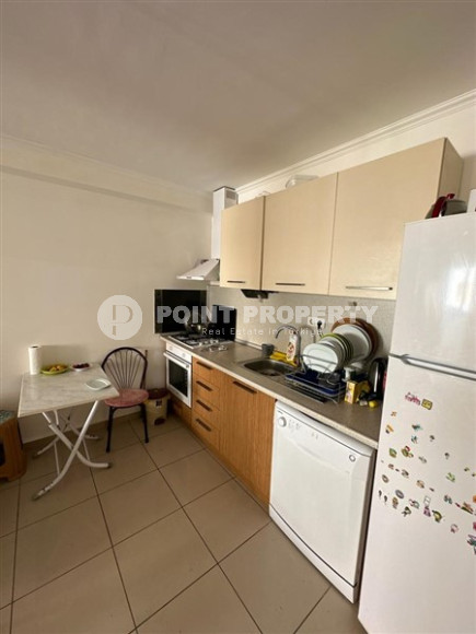 Inexpensive apartment 60 m2 with furniture and a glazed balcony in a high-rise building, Mahmutlar district-id-4474-photo-4