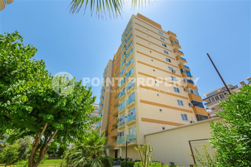 Inexpensive apartment 60 m2 with furniture and a glazed balcony in a high-rise building, Mahmutlar district-id-4474-photo-7