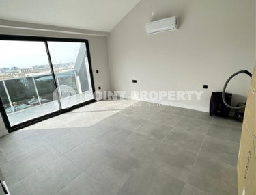 Двухуровневая квартира с площадью 125 м2 и двумя балконами в районе Каргыджак-id-4476-фото-3