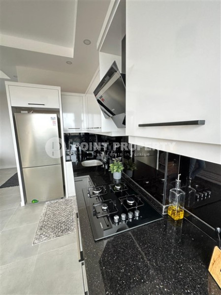 Двухуровневая квартира с площадью 125 м2 и двумя балконами в районе Каргыджак-id-4476-фото-5