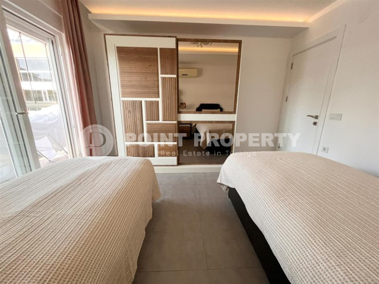 Стильная современная квартира 2+1, общей площадью 110 м2, в нескольких минутах ходьбы от моря и центра района Оба.-id-4477-фото-10