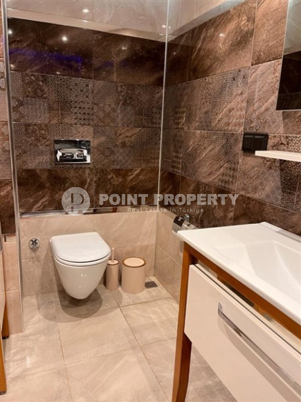 Стильная современная квартира 2+1, общей площадью 110 м2, в нескольких минутах ходьбы от моря и центра района Оба.-id-4477-фото-14