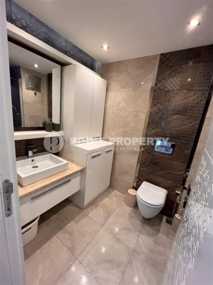 Стильная современная квартира 2+1, общей площадью 110 м2, в нескольких минутах ходьбы от моря и центра района Оба.-id-4477-фото-16