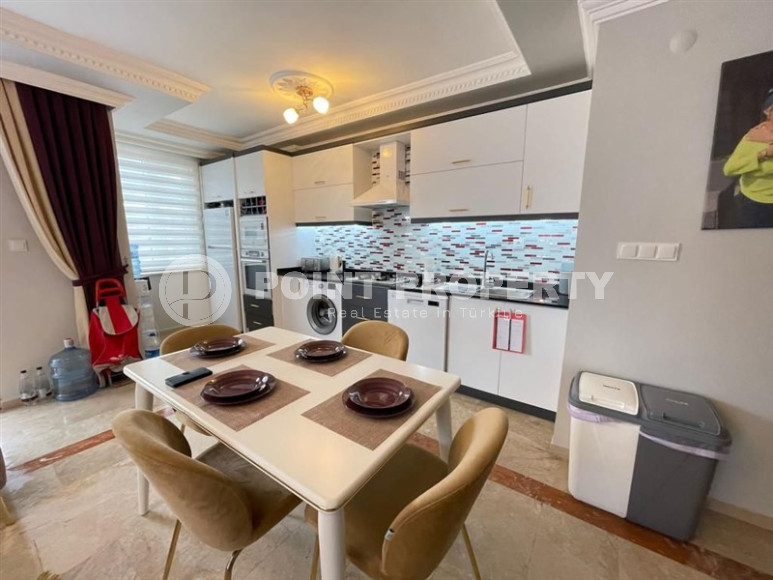 Panoramic apartment 3+1 on the 10th floor in the center of Mahmutlar.-id-4478-photo-3