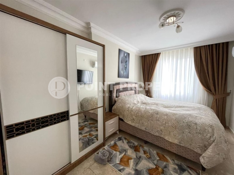 Panoramic apartment 3+1 on the 10th floor in the center of Mahmutlar.-id-4478-photo-5