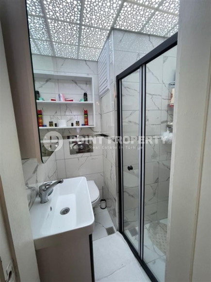 Panoramic apartment 3+1 on the 10th floor in the center of Mahmutlar.-id-4478-photo-13