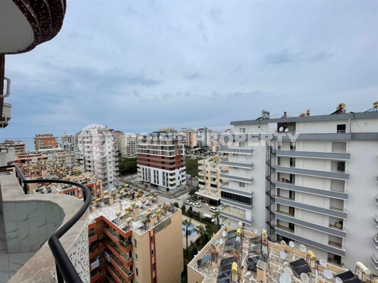 Panoramic apartment 3+1 on the 10th floor in the center of Mahmutlar.-id-4478-photo-17