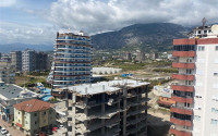 Panoramic apartment 3+1 on the 10th floor in the center of Mahmutlar.-id-4478-photo-25