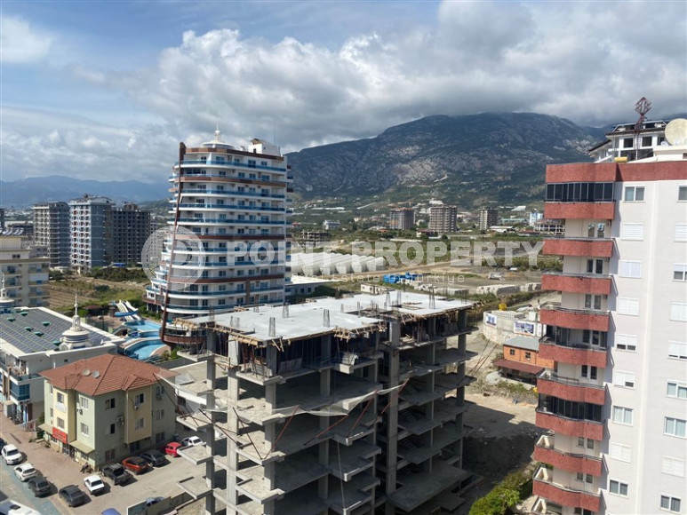 Panoramic apartment 3+1 on the 10th floor in the center of Mahmutlar.-id-4478-photo-25