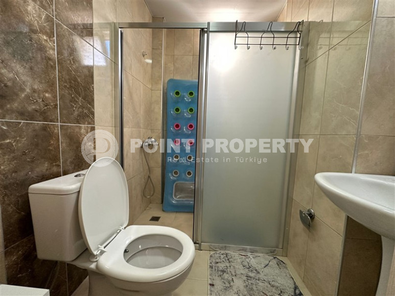 Большая квартира с одной спальней в 150 метрах от моря в центре развитого благоустроенного района Махмутлар.-id-4482-фото-7