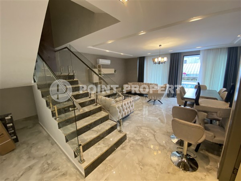 New two-level apartment with a pleasant, bright interior, furniture and household appliances, 250 meters from the sea.-id-4493-photo-3