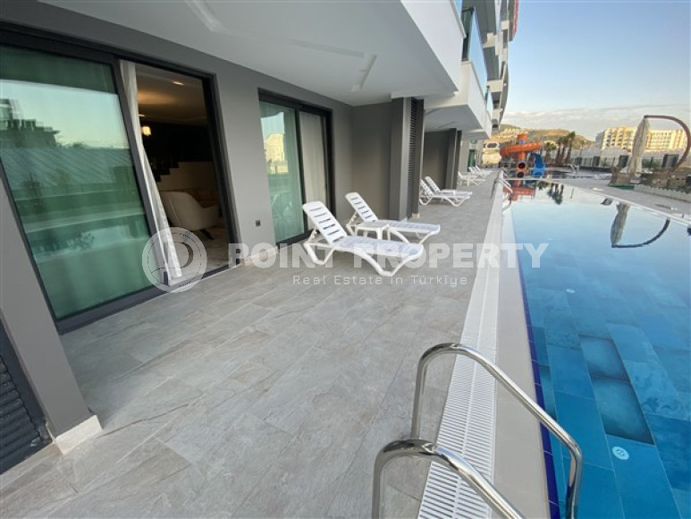 New two-level apartment with a pleasant, bright interior, furniture and household appliances, 250 meters from the sea.-id-4493-photo-8