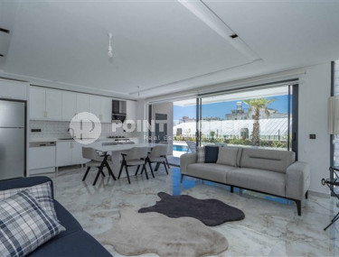 Stylish two-level apartment with access to the pool in a comfortable residential complex, commissioned in 2022.-id-4494-photo-1