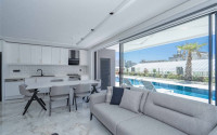 Stylish two-level apartment with access to the pool in a comfortable residential complex, commissioned in 2022.-id-4494-photo-2