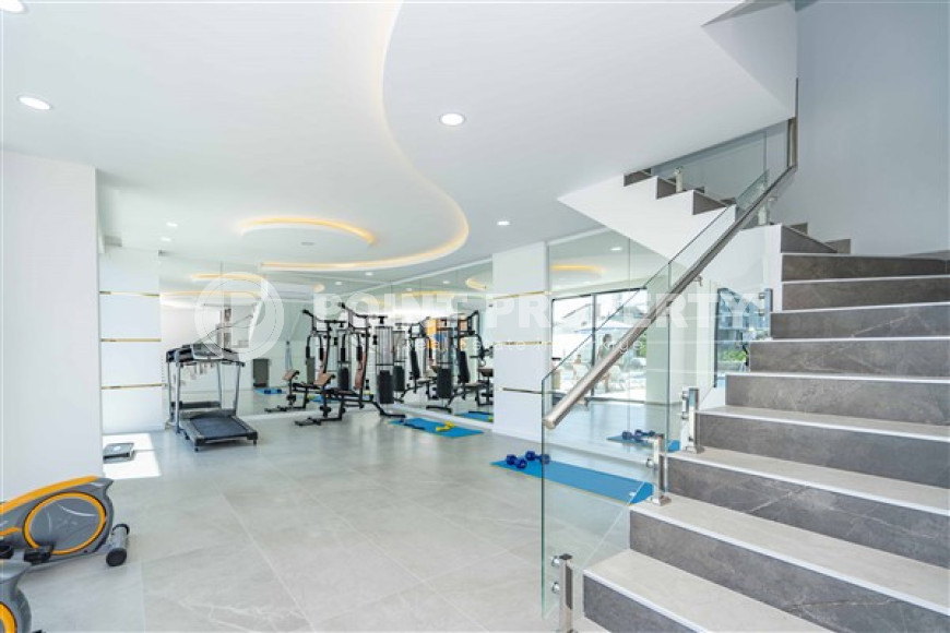 Stylish two-level apartment with access to the pool in a comfortable residential complex, commissioned in 2022.-id-4494-photo-4