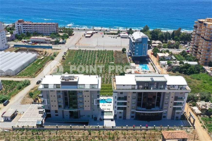 Stylish two-level apartment with access to the pool in a comfortable residential complex, commissioned in 2022.-id-4494-photo-19