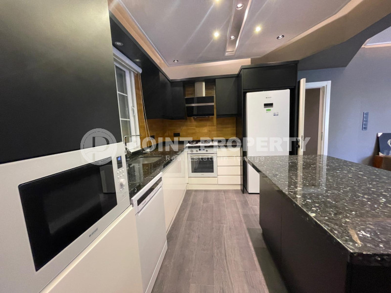 Стильные современные апартаменты с новым ремонтом, мебелью и бытовой техникой в 500 метрах от знаменитого пляжа Клеопатры.-id-4495-фото-6