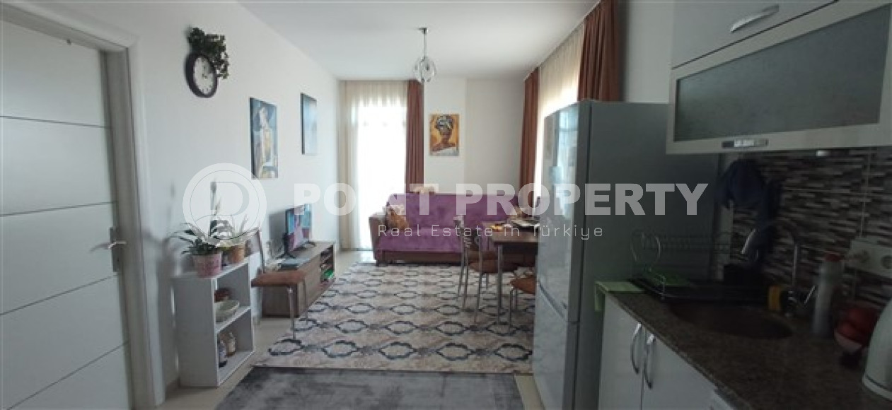 Бюджетные апартаменты 1+1 в полутора километрах от моря в перспективном районе Аланьи - Конаклы.-id-4499-фото-2