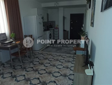 Бюджетные апартаменты 1+1 в полутора километрах от моря в перспективном районе Аланьи - Конаклы.-id-4499-фото-3