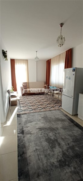 Бюджетные апартаменты 1+1 в полутора километрах от моря в перспективном районе Аланьи - Конаклы.-id-4499-фото-4