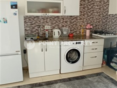 Бюджетные апартаменты 1+1 в полутора километрах от моря в перспективном районе Аланьи - Конаклы.-id-4499-фото-5