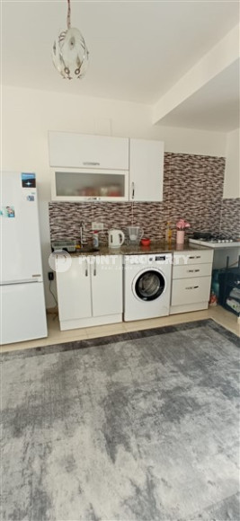 Бюджетные апартаменты 1+1 в полутора километрах от моря в перспективном районе Аланьи - Конаклы.-id-4499-фото-5