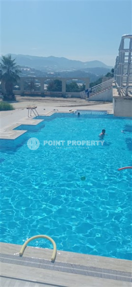 Бюджетные апартаменты 1+1 в полутора километрах от моря в перспективном районе Аланьи - Конаклы.-id-4499-фото-11