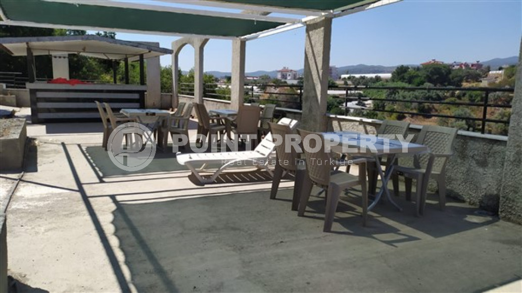 Бюджетные апартаменты 1+1 в полутора километрах от моря в перспективном районе Аланьи - Конаклы.-id-4499-фото-12