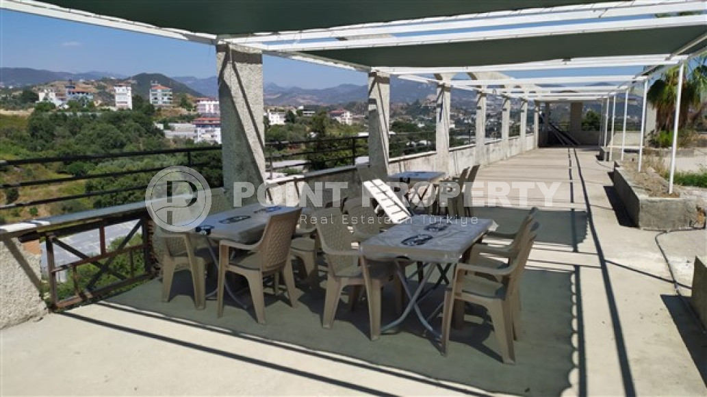 Бюджетные апартаменты 1+1 в полутора километрах от моря в перспективном районе Аланьи - Конаклы.-id-4499-фото-14