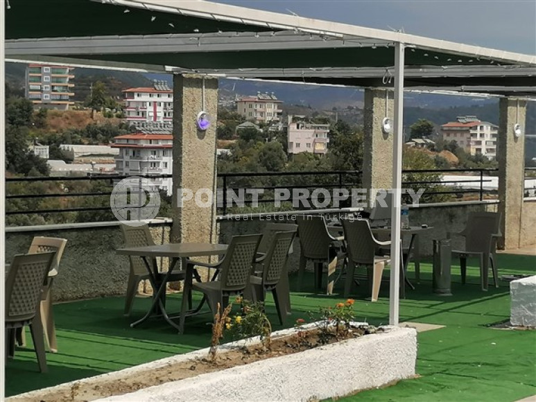 Бюджетные апартаменты 1+1 в полутора километрах от моря в перспективном районе Аланьи - Конаклы.-id-4499-фото-15